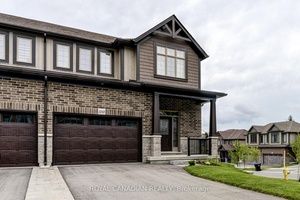 Discover the Aurora Model A Stylish End Unit Townhouse with Walkout Basement.
