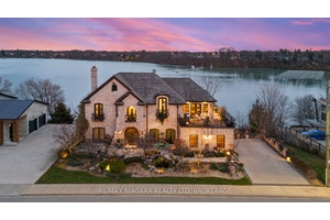 Pristine waterfront living meets timeless European elegance.