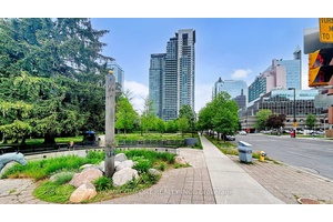 Wow ! Rare To Find Southeast Corner unit with an unobstructed view of the stunning Menkes condominium located in the heart of Toronto.