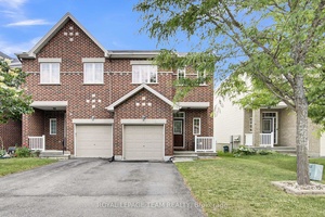 Beautifully updated end unit townhome with open plan living, 3 bedrooms, 3 baths amp ; a wonderful finished lower level.