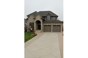 Welcome to 2314 Ballymote Way, a stunning 4 1 bedroom home nestled in the desirable Ballymote Woods community.