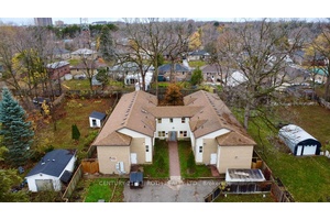 43 bedroom rooming house with 2 huge kitchens on a large property with ample parking.