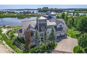 Luxury Waterfront Estate with Private Guest House amp ; Income Potential Welcome to 17 Swan Lane a rare opportunity to own a stunning waterfront residence in the exclusive community of ...