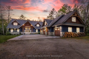 Top Reasons You Will Love This Home Experience the epitome of lakeside living in this breathtaking 5, 348 square foot waterfront estate, gracefully set on nearly two acres of pristine ...