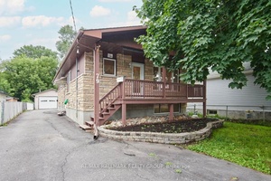 Step into the charm of this spacious and sun filled three bedroom main floor unit !