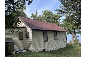 Discover potential on Margaret's Island with this fixer upper cottage, a 3 bedroom, 1 bath retreat boasting waterfront on both sides 170 feet on one side amp ; over 100 ...
