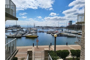 South Beach, Harbour Front stack townhouse, one level unit on upper stack with two bedrooms, updated 2 years ago.