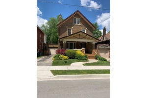 Welcome to the Village ! This beautiful three story century home has been meticulously renovated from top to bottom, showcasing character finishes and vintage charm.