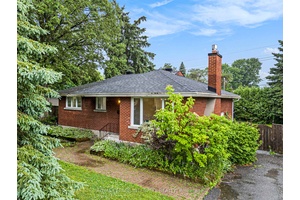2025 totally renovated beautiful all brick bungalow 3 2 bedrooms on oversized wonderfully landscaped 75 100 private lot.
