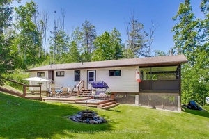 4 SEASON FREEHOLD PROPERTY Meticulously Maintained Inside amp ; Out VERY CLEAN Fully Furnished Turn Key 3 BEDROOM RAISED BUNGALOW Quiet Tree Lined Lot on PRIVATE ROAD W DEEDED LAKE ...