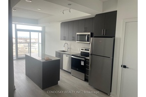 Step into modern living with this bright and thoughtfully laid out 1 bedroom den, 1 bathroom condo in the desirable LJM Tower.