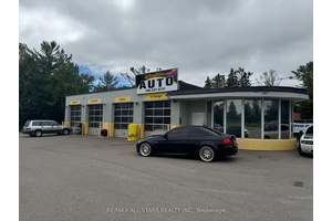 Located at 14806 Woodbine Avenue in Whitchurch Stouffville, this 4 bay mechanic shop offers a fantastic opportunity on a spacious.