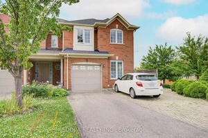 Welcome to this bright and airy end unit townhome feels just like a spacious semi !