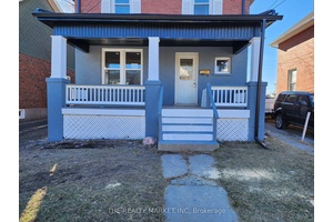 Renovated main floor unit, can be used as an office, one block from the Courthouse ; use of backyard ;