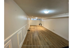 Updated Bright Unit, Close To High Ranked Bayview Secondary School And Shopping Centres, 2 Parking Spots and separate laundry