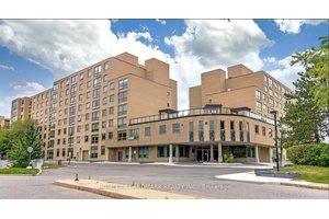 Corner Bright Suite Great Split Bedroom The Biggest Unit In This Building 1260sqft Update Kitchen Two parking Spots one of the spots is tandem Gas, Hydro, Water Included In Rent.