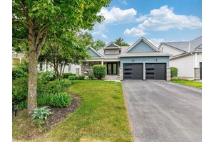 Nestled on a quiet family friendly street you'll immediately be impressed with the gorgeous exterior featuring many upgrades including metal roof, double door entry, shaker shingles, stone fac ade, lighting, ...