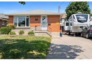 Welcome to this impressive 3 1 bedroom, 2 bath solid brick bungalow nestled in a quiet, mature East Oshawa neighborhood.