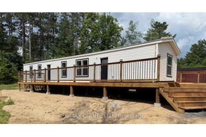 Brand New ! Enjoy year round, modern living in this brand new 2 bed, 2 bath mobile home, on a large lot just 5 minutes from Tweed.