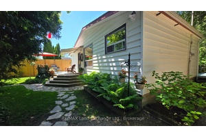 This cottage is a perfect blend of where nature and the sounds of Lake Huron come together.