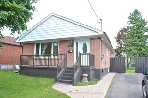 Welcome Home ! Detached Brick Bungalow Basement Level Walking Distance To Victoria Park Subway Station And Close To Shops, Cafes, Parks More !