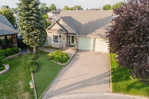 A rare Barrhaven bungalow on an oversized pie shaped lot with over 9, 000 sqft of space.