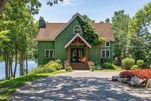 Stunning updated open concept Upper Canada post and beam year round home on beautiful Loughborough Lake just north of Kingston.