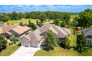 ENJOY THE 19TH HOLE IN THIS BEAUTIFUL BRICK BUNGALOW BACKING ONTO THE 14TH TEE OF THE KINGSWELL GLEN GOLF COURSE NESTLED ON ONE OF PETROLIA, ONT'.