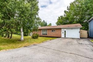4 Season Home with Walk Out Basement on a Quiet Street Minutes to Town amp ; Marinas.