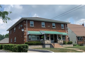 ATTENTION ALL INVESTORS. SOLID AS A ROCK, THIS ALL BRICK4 OR 5 UNIT APARTMENT IS METIOUSLY KEPT AND UPDATED.
