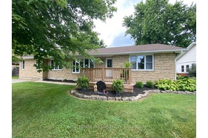 Move right into this well maintained 3 bedroom, 2 bath brick bungalow nestled in the quaint town of Thedford.