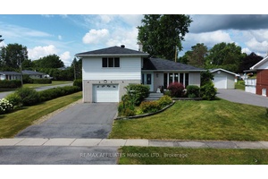 Step into serenity at 11 Ault Drive !