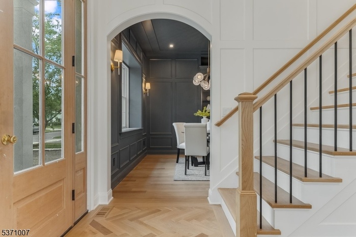 Foyer w/herringbone flooring