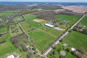 Equestrian 84 acre property located atop Ridgeway Ridge Just minutes to all amenities, major Hwys and the US border.