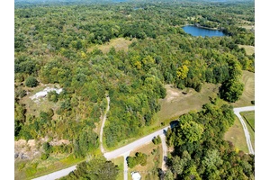 Vacant land parcel near Bobs Lake with 5 acres of land and 279 feet of road frontage along the north side of Crozier Road.