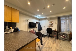 Welcome To This Impeccably Maintained Furnished Studio Townhouse Unit, Featuring Stylish Laminate Flooring Throughout.