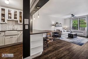 MAGICAL MID CENTURY ! On a quiet, idyllic tree lined street primarily consisting of prewar buildings, you'll find this masterpiece of a 1BR 1BA nestled atop greenery right outside the ...