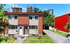 Welcome to 1303 Coldrey Avenue a rare and exciting opportunity to own a charming freehold end unit townhome in the vibrant and rapidly evolving community of Carlington !