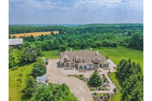 Set on over 96 acres of rolling countryside, this exceptional estate offers a rare blend of refined living and natural beauty.