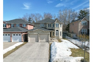 Rarely Offered, Furnished Family Home Backing Onto Environmentally Protected Land In The Ardagh Bluffs Is What You Have Been Looking For !
