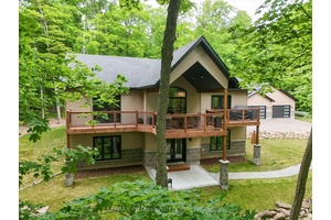 This stunning 4 YEAR new home designed for comfort and luxury, offering Muskoka living at its best with breathtaking views and access to Walker Lake, almost 6 acres of hardwood ...