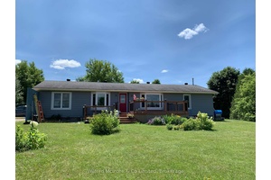 Discover this 4 1 bed, 3 bath bungalow situated on a spacious 1 acre lot just south of Durham on Highway 6.