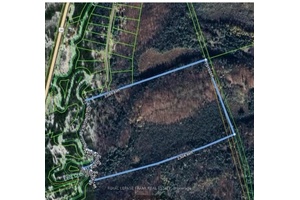 EELS CREEK Rare opportunity to own 70 acres on the edge of town with over 1860 feet on beautiful Eels Creek.