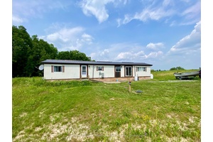 Charming and Affordable 2 Bedroom Mobile Home on a Scenic Country Lot.