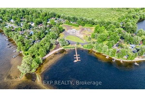 Rare offering of nearly 6 acres of CT zoned land Commercial Tourism just off the Mississippi River, fully approved for 30 seasonal trailer sites with significant potential.