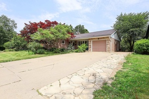 This three plus one bedroom, three bathroom bungalow has an incredible private, peaceful and sprawling rear yard with fire pit area and heart shaped pond including a stand alone 18 ...