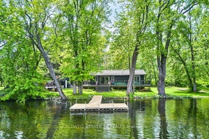 Welcome To Your Private Waterfront Retreat With Over 400 Feet Of Frontage On The Severn River, Offering Direct Access To Sparrow Lake And The Renowned Trent Severn Waterway.