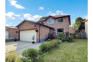 Stunning Freehold Home with double car garage located in a family friendly neighbourhood !