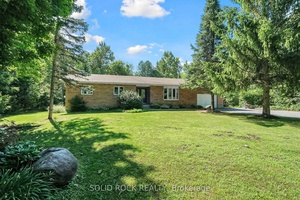Welcome to this charming and beautifully maintained bungalow set on a serene 2.