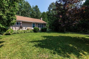 Where Riverfront Meets Relaxation Welcome to 29 Heron Point Road, featuring direct river access !